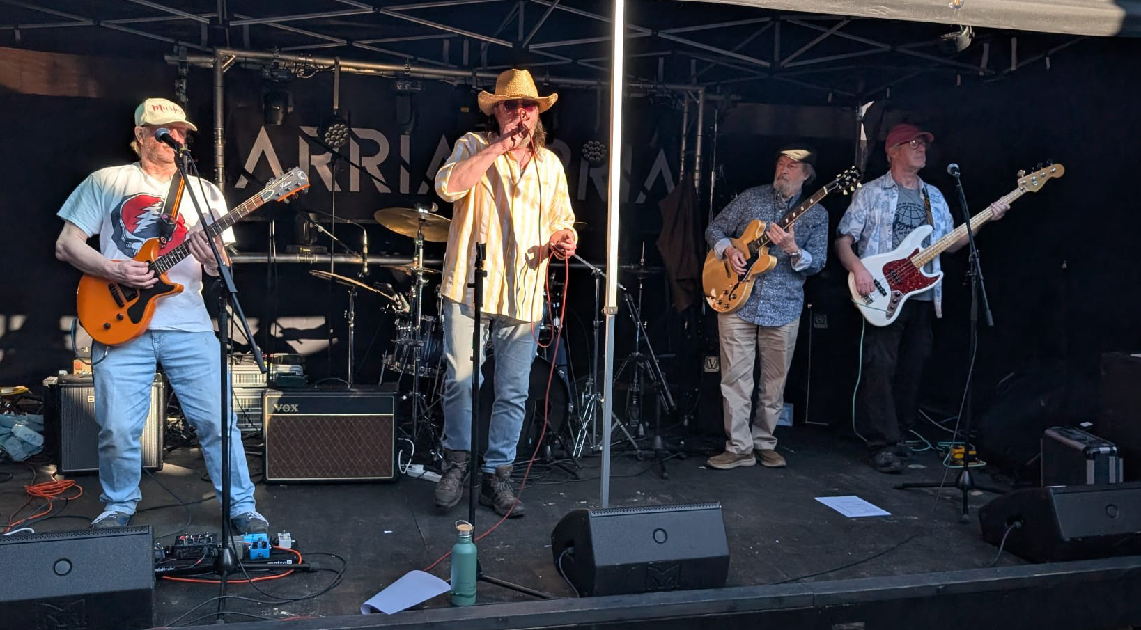 Borrowed Time rock band in action at a live gig